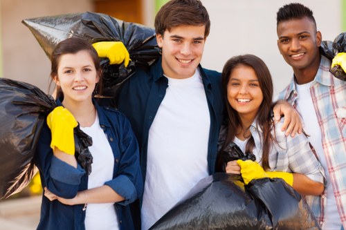 Workers sorting demolition waste materials