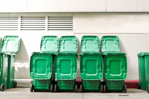 Team of professionals performing rubbish clearance in South East London